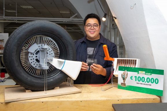 The Tyre Collective co-founder and CEO Hanson Cheng pictured with the device deisgned to halt tyre pollution.