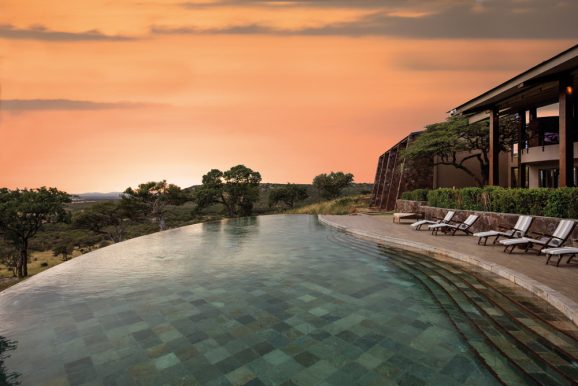 infinity pool with sunset