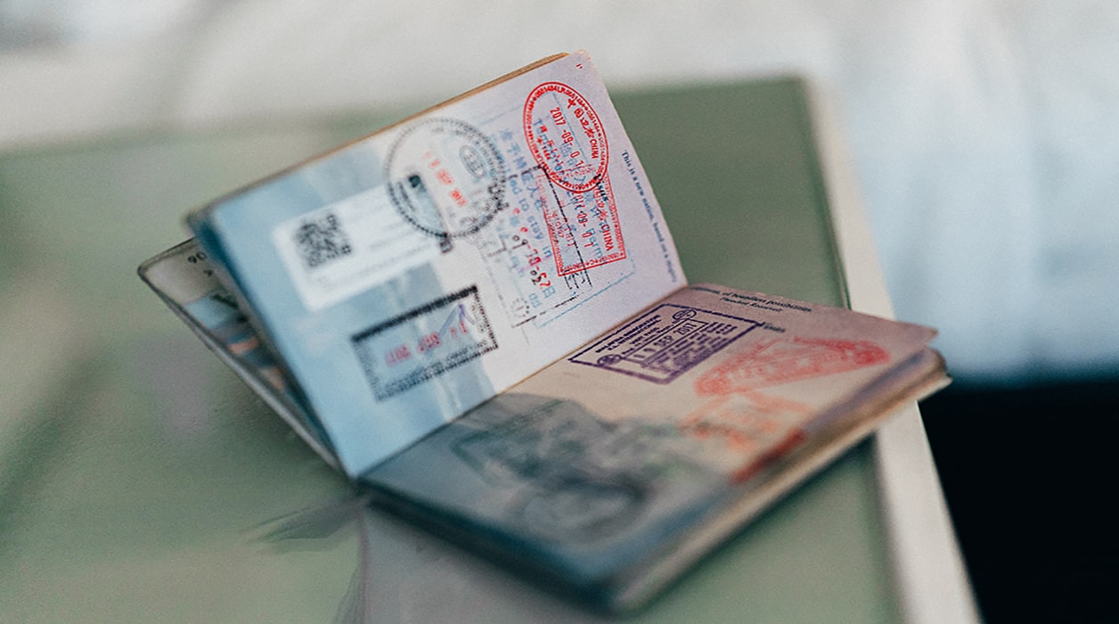 A passport open to the stamp page